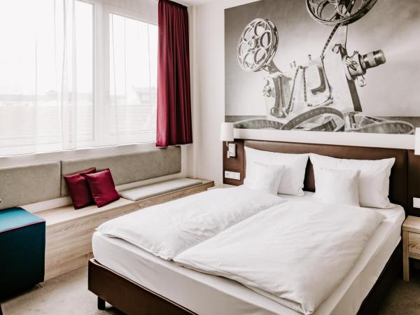 Vienna House Easy by Wyndham München : photo 4 de la chambre chambre confort plus