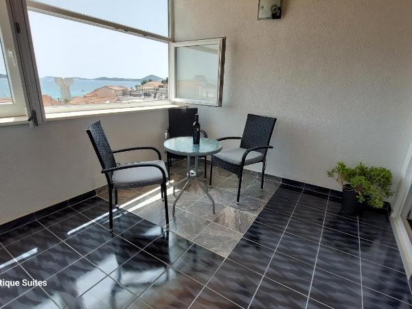 Refresh Boutique Suites - Central Point : photo 2 de la chambre suite lit king-size - vue sur mer