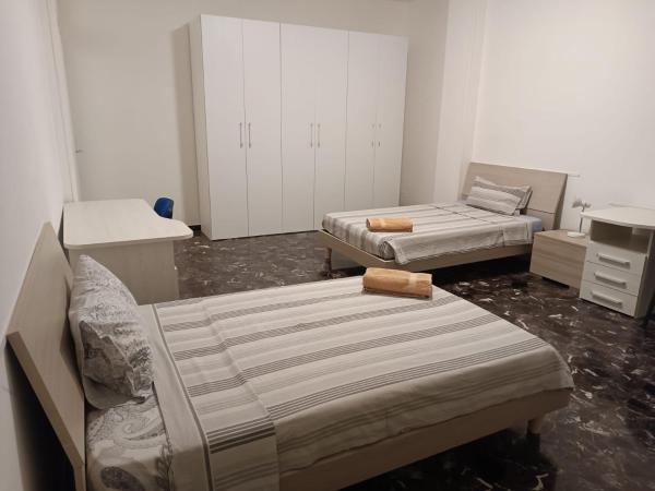 Affittacamere Pratello 97 : photo 3 de la chambre chambre lits jumeaux