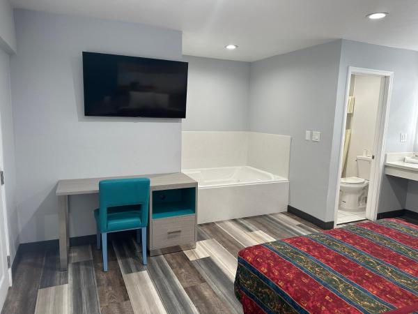 Sahara Inn - Los Angeles : photo 4 de la chambre chambre lit king-size avec baignoire spa