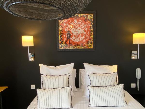 Hôtel Le Neptune en Camargue : photo 4 de la chambre chambre lit king-size