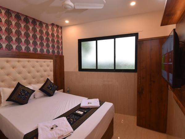 Hotel Dream Palace Residency - Near LBS Marg Kural West : photo 10 de la chambre chambre deluxe