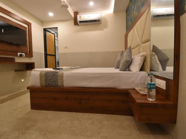 Hotel Dream Palace Residency - Near LBS Marg Kural West : photo 10 de la chambre chambre lit king-size supérieure