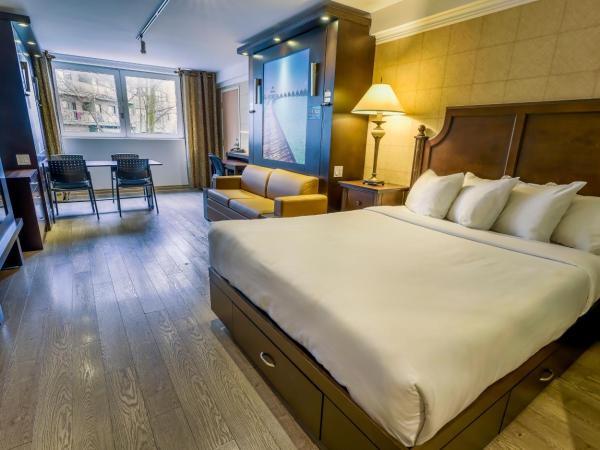 LHotelQuébec : photo 2 de la chambre studio avec 3 lits queen-size