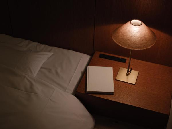 Negiya Ryofukaku : photo 5 de la chambre chambre lits jumeaux d'angle deluxe avec coin tatami - vue sur montagnes - tour est - non-fumeurs