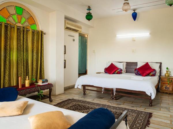 Dreamyard Udaipur : photo 6 de la chambre chambre double ou lits jumeaux deluxe - vue sur lac