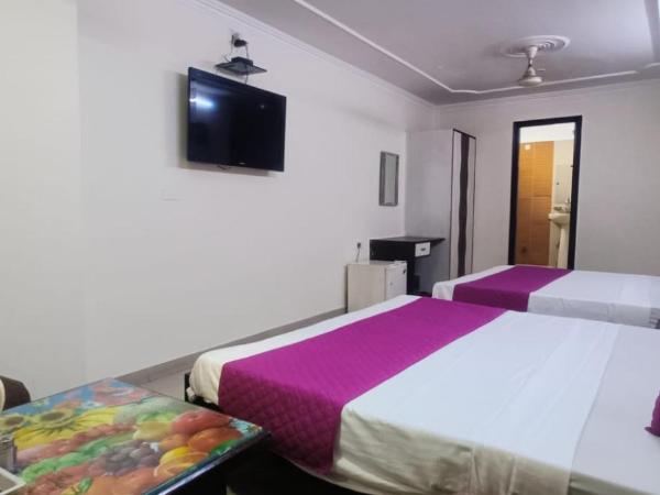 Hotel Jigyasa By Mayda Hospitality Pvt. Ltd. : photo 3 de la chambre chambre quadruple premium
