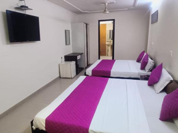 Hotel Jigyasa By Mayda Hospitality Pvt. Ltd. : photo 2 de la chambre chambre quadruple premium