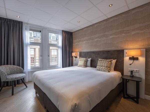 Hotel Amsterdam De Roode Leeuw : photo 5 de la chambre chambre confort double ou lits jumeaux avec vue sur la ville