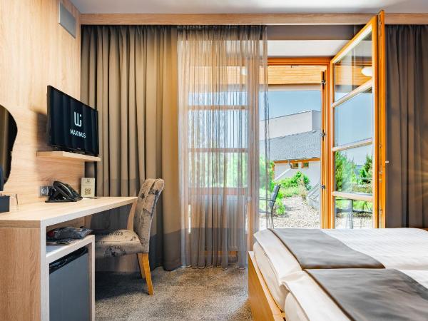 Maximus Resort : photo 1 de la chambre chambre lits jumeaux avec terrasse