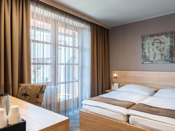 Maximus Resort : photo 3 de la chambre chambre lits jumeaux avec terrasse