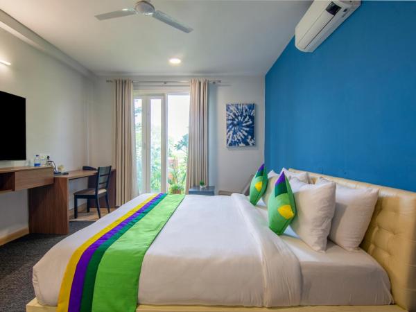 Treebo Jass Hospitality Services - Sec 53 : photo 2 de la chambre chambre double deluxe