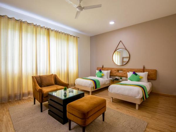 Treebo Jass Hospitality Services - Sec 53 : photo 3 de la chambre chambre double deluxe