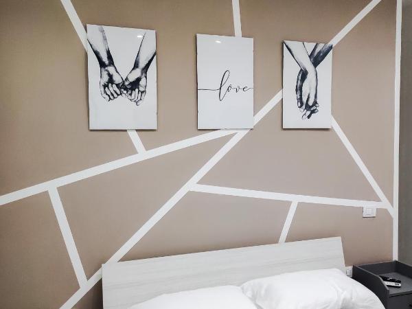 Dantonarooms : photo 4 de la chambre chambre quadruple