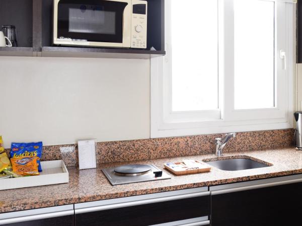 Argenta Suites Belgrano : photo 5 de la chambre chambre exécutive avec 2 lits queen-size