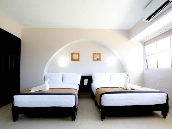 Hotel Caribe Internacional Cancun : photo 3 de la chambre chambre lits jumeaux supérieure