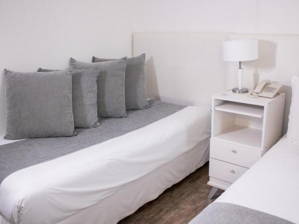 Ker Recoleta Hotel : photo 3 de la chambre chambre triple