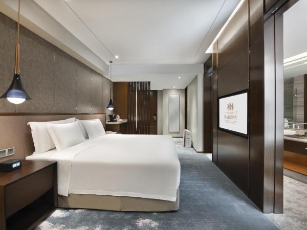Grand Barony Qingdao Airport Hotel : photo 1 de la chambre 行政大床房