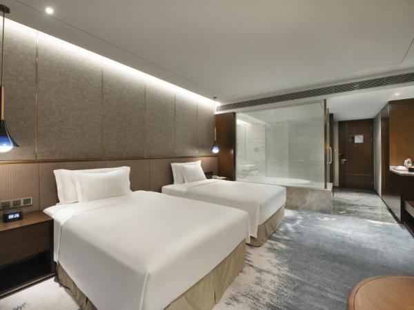 Grand Barony Qingdao Airport Hotel : photo 1 de la chambre 行政双床房