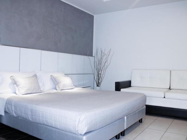 Atmosphere Suite Hotel : photo 1 de la chambre suite junior avec balcon (3 adultes)