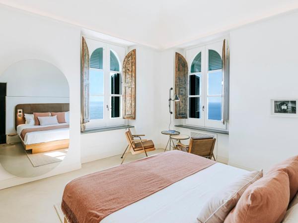 Faro Punta Imperatore : photo 1 de la chambre chambre double deluxe - vue sur mer