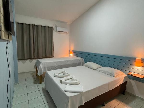 Pousada Encanto dos Mares : photo 7 de la chambre chambre triple supérieure