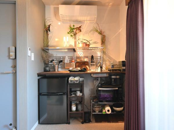 Hotel Tokyo Hub : photo 9 de la chambre chambre quadruple avec balcon