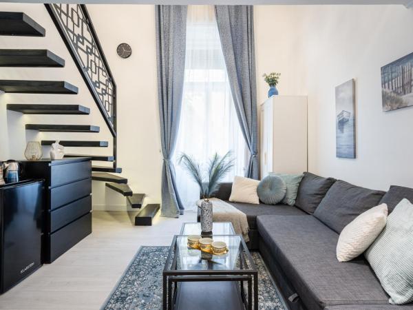 Szent István Apartments : photo 10 de la chambre chambre double supérieure avec deux lits doubles