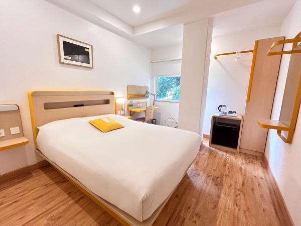 bloomrooms @ City Centre : photo 1 de la chambre chambre exécutive lit queen-size