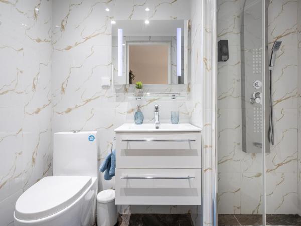 Szent István Apartments : photo 5 de la chambre chambre double supérieure avec deux lits doubles