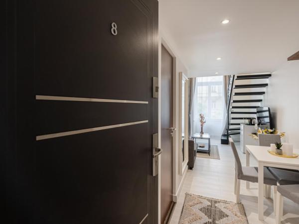 Szent István Apartments : photo 2 de la chambre chambre supérieure avec 2 lits queen-size