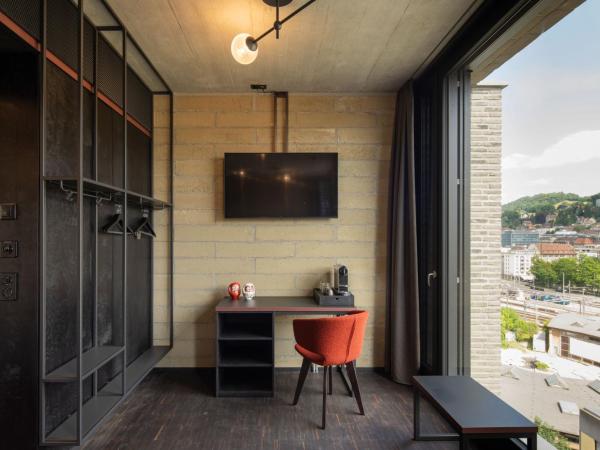 Tailormade Hotel LEO St Gallen : photo 3 de la chambre roof top queen