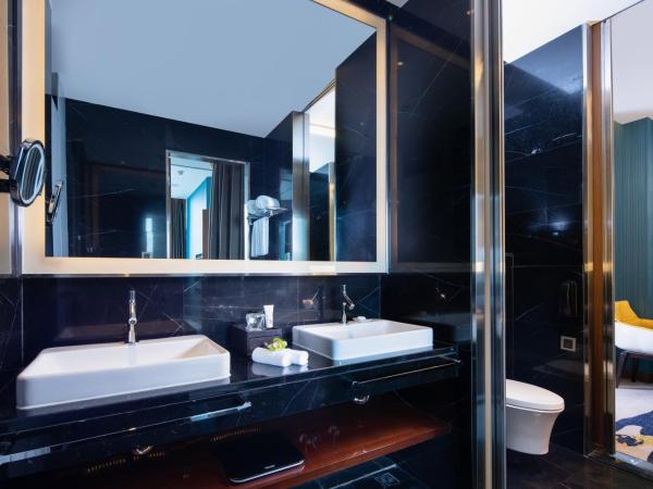 Rocase Boutique Hotel Wuxi : photo 5 de la chambre deluxe balcony suite 360° city resort