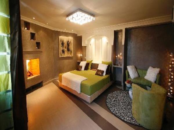 Riad Carllian : photo 7 de la chambre suite lit king-size avec jacuzzi