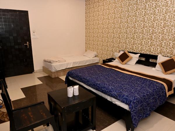 Om Heritage Haveli : photo 10 de la chambre chambre triple deluxe