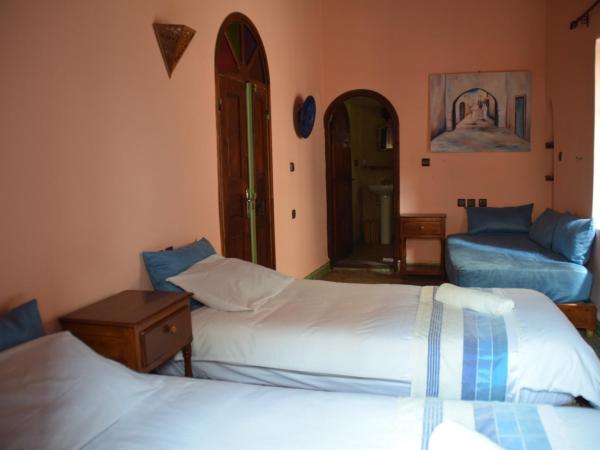 Riad Saltana : photo 4 de la chambre grande chambre triple avec baignoire