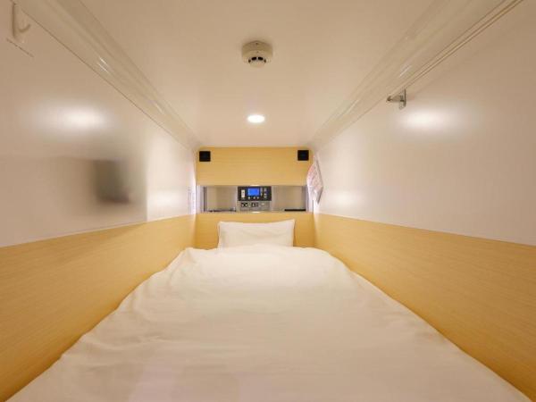 Acro Capsule Hotel Namba Dotonbori : photo 7 de la chambre woman capsule room - upper bed