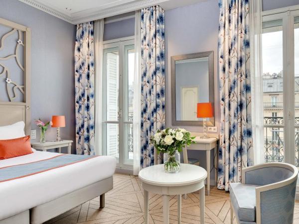 Splendid Etoile : photo 1 de la chambre chambre double supérieure avec balcon