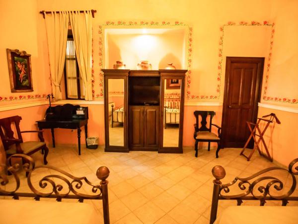 Hotel Boutique La Mision De Fray Diego : photo 2 de la chambre suite deluxe 2 double beds & garden view