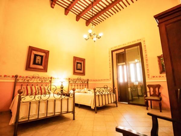 Hotel Boutique La Mision De Fray Diego : photo 6 de la chambre suite deluxe 2 double beds & garden view