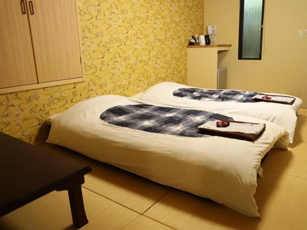 和正堂・禅 : photo 9 de la chambre chambre lits jumeaux avec salle de bains