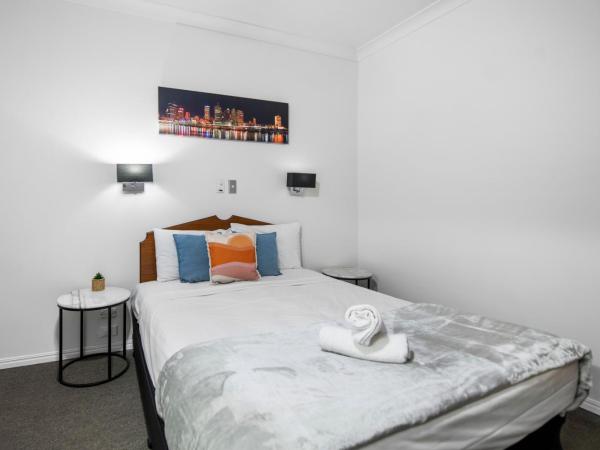 Airport Clayfield Motel : photo 1 de la chambre chambre communicante