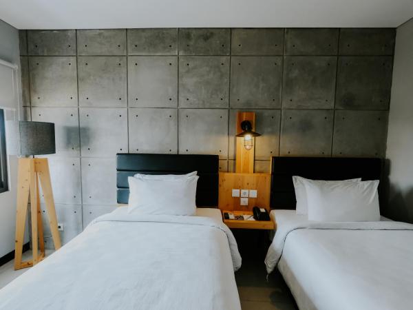 Ayaartta Hotel Malioboro : photo 3 de la chambre chambre lits jumeaux supérieure