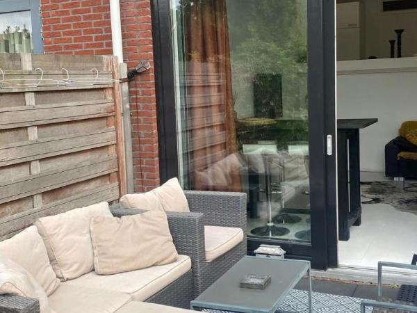 Canal Garden Apartment StayWell Amsterdam : photo 2 de la chambre appartement avec jardin