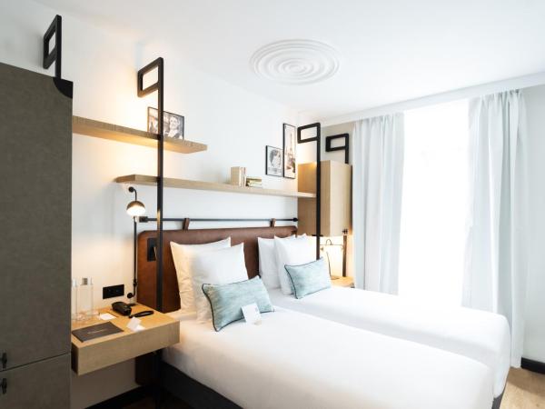 Esteem Tour Eiffel : photo 1 de la chambre chambre lits jumeaux