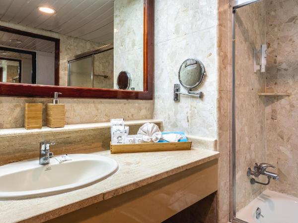 Marien Puerto Plata - All Inclusive : photo 1 de la chambre hébergement lit king-size deluxe - vue sur jardin