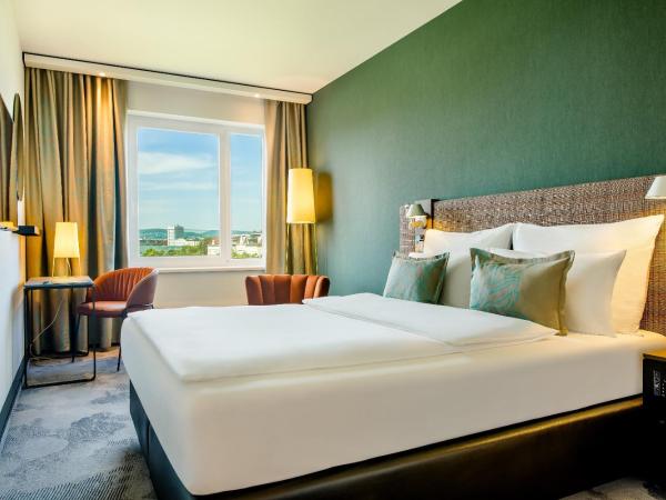 Motel One Wien-Prater : photo 1 de la chambre chambre lit queen-size