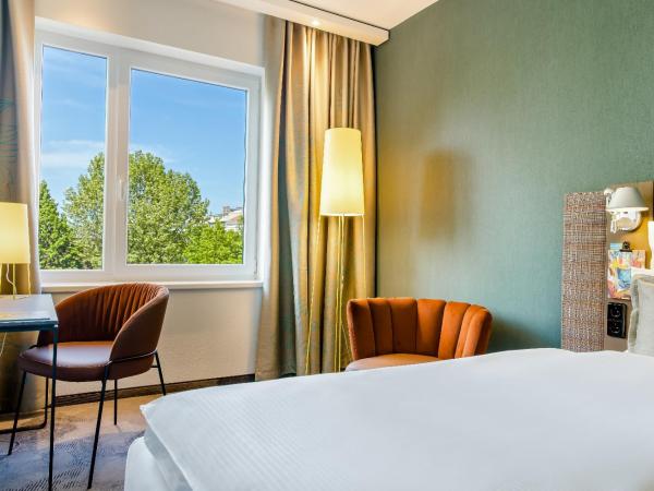 Motel One Wien-Prater : photo 3 de la chambre chambre lit queen-size