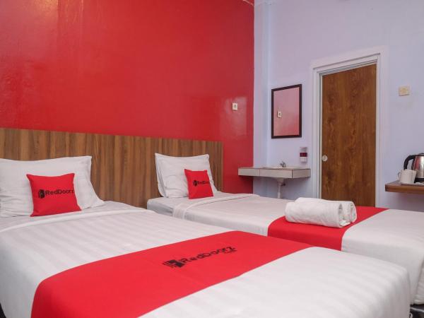 RedDoorz At Pondok Eyang Obi Sleman : photo 7 de la chambre chambre lits jumeaux deluxe