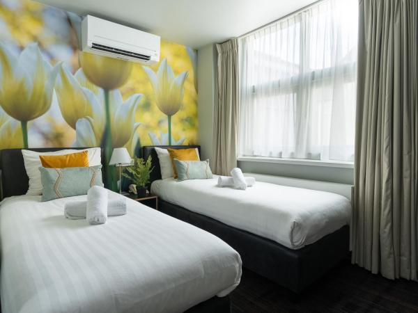 Multatuli Hotel : photo 4 de la chambre chambre quadruple